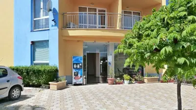 a car parked in front of a building at Residence Livi Paradise Sunny Beach! 2 plus 1 - 600m away from the beach in Sunny Beach