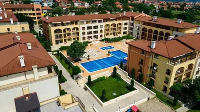 an aerial view of a mansion with a swimming pool at Чудесно място с басейн 